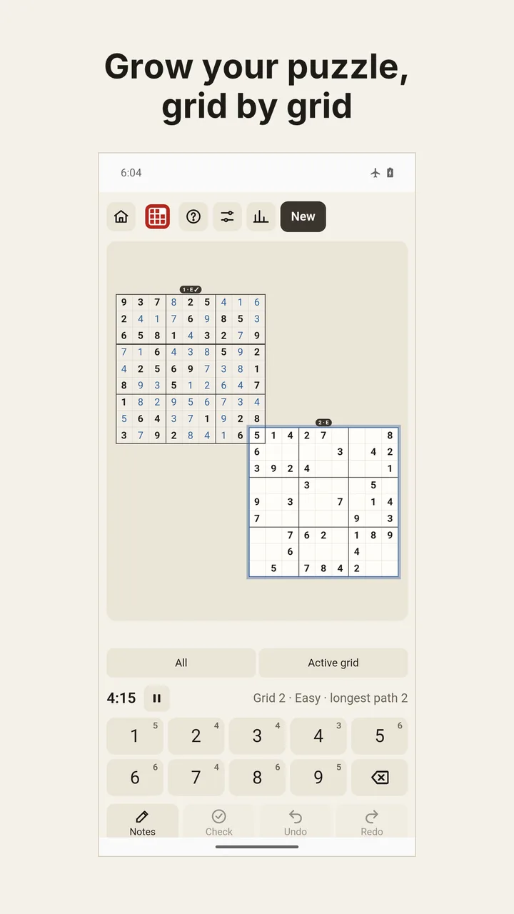 Development preview of the Android app: Expand mode with two Sudoku grids sharing a corner cell.